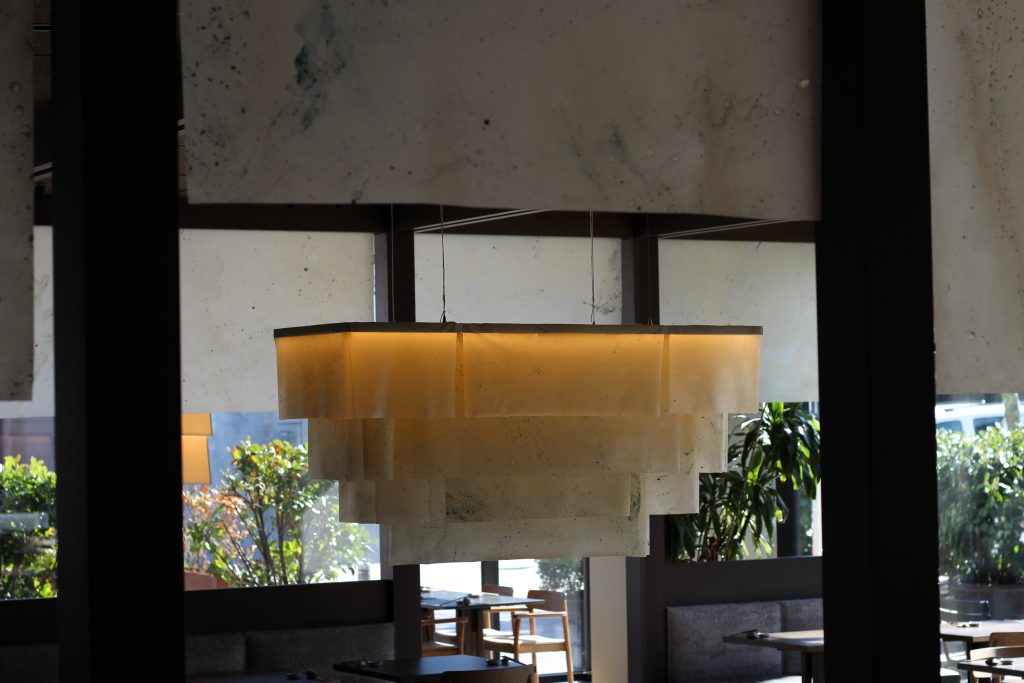 Natural Material Studio's seaweed and algae bio-textile installation at Sticks’n’Sushi in Lyngby.