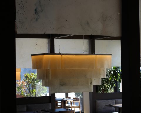 Natural Material Studio's seaweed and algae bio-textile installation at Sticks’n’Sushi in Lyngby.