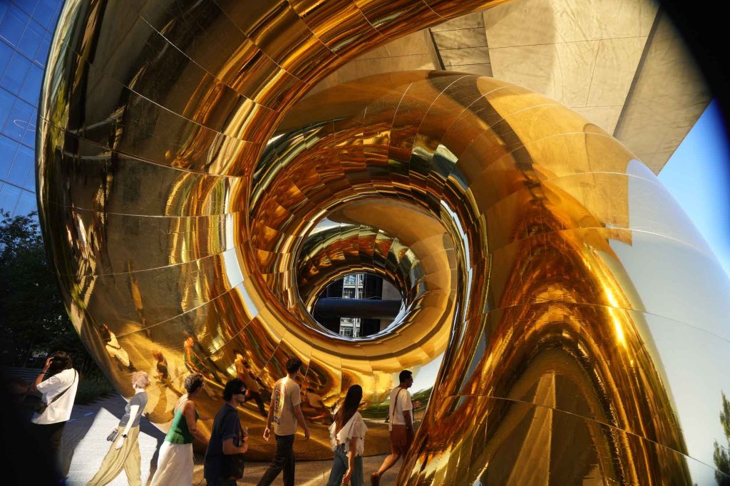 Looking into a gold coil of auruBOROS