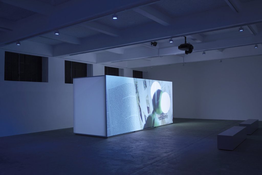 Video installation on a large white structure