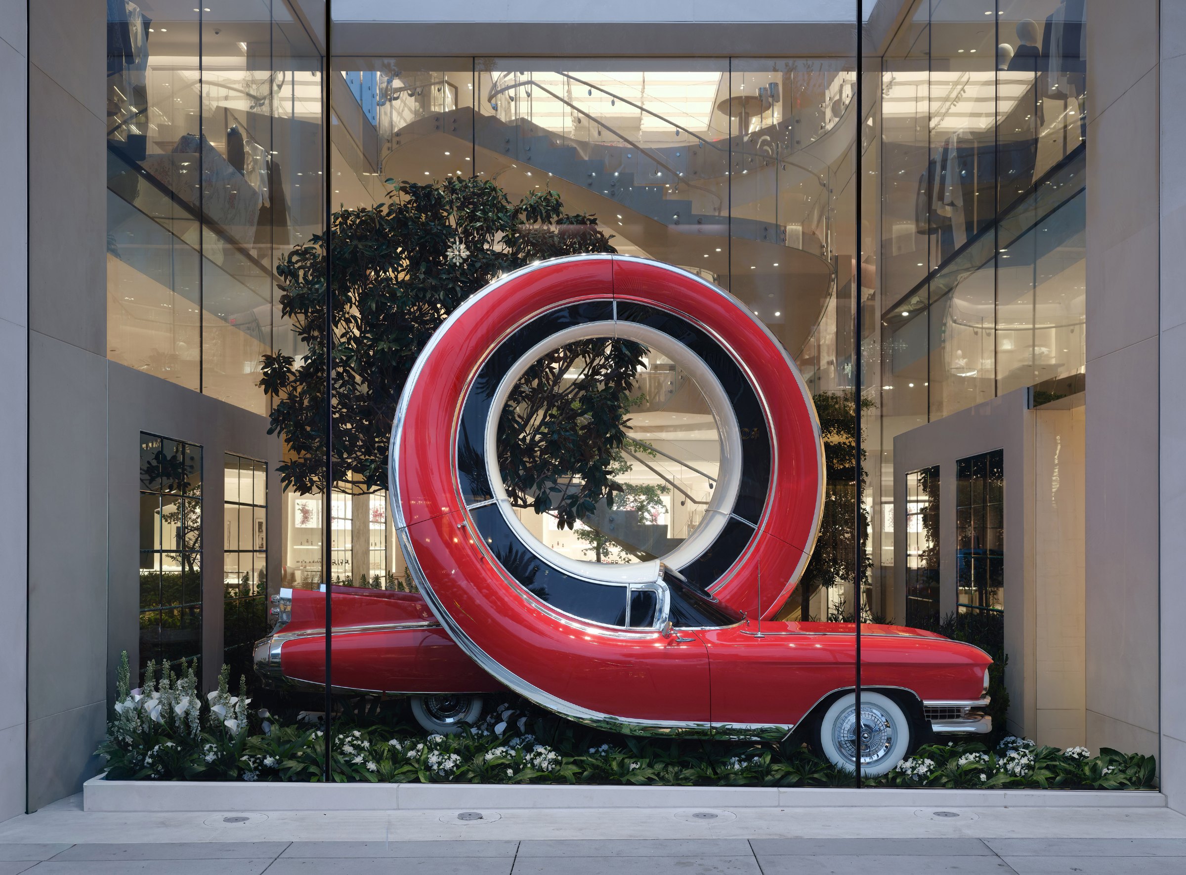 Dior window display by Alex Chinneck