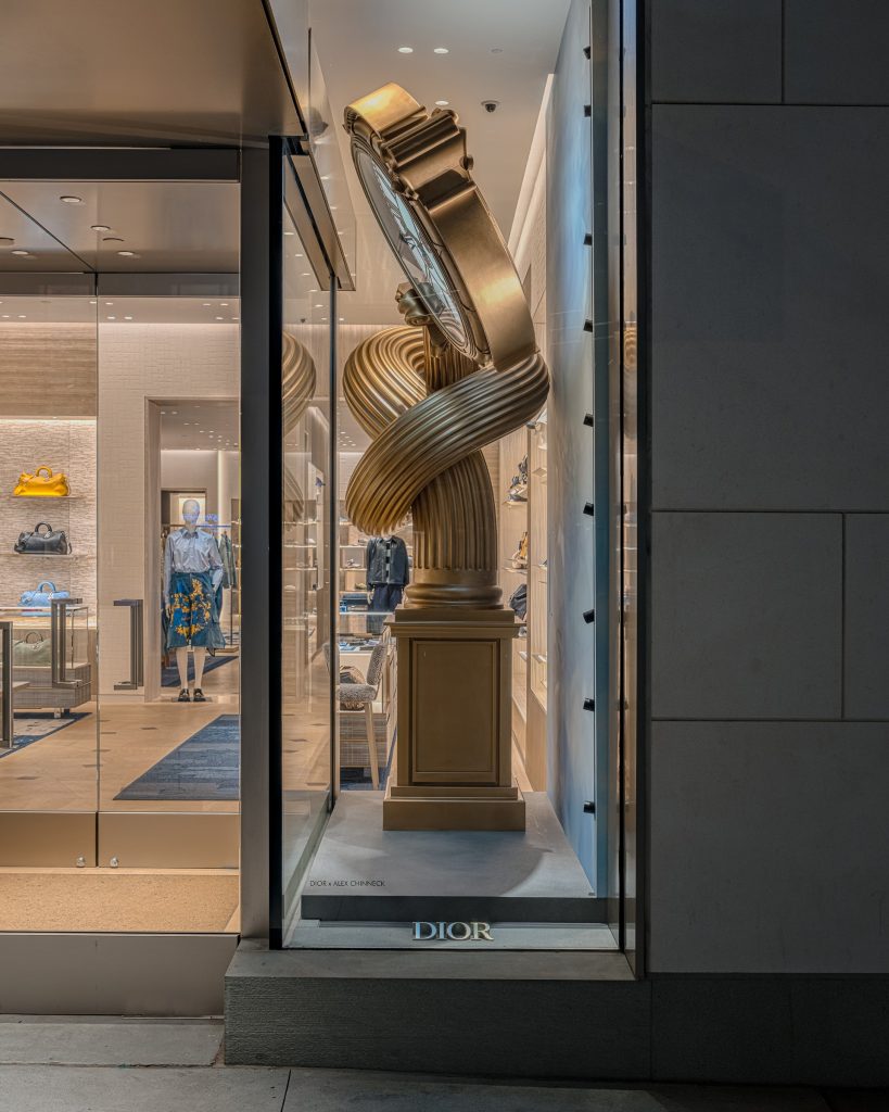 Dior window display by Alex Chinneck