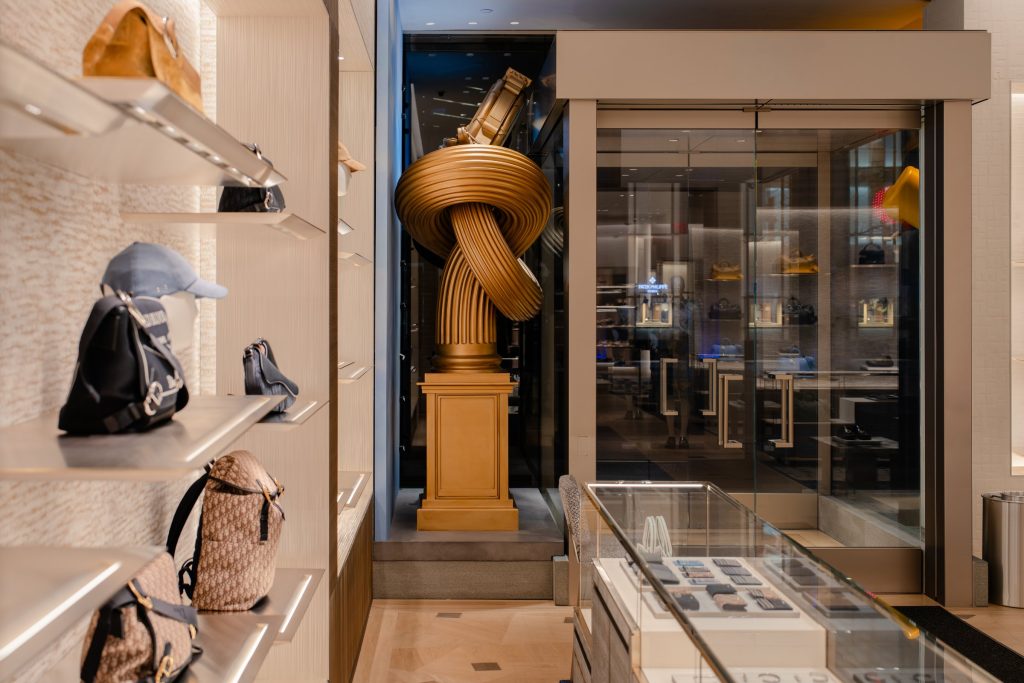 Dior window display by Alex Chinneck