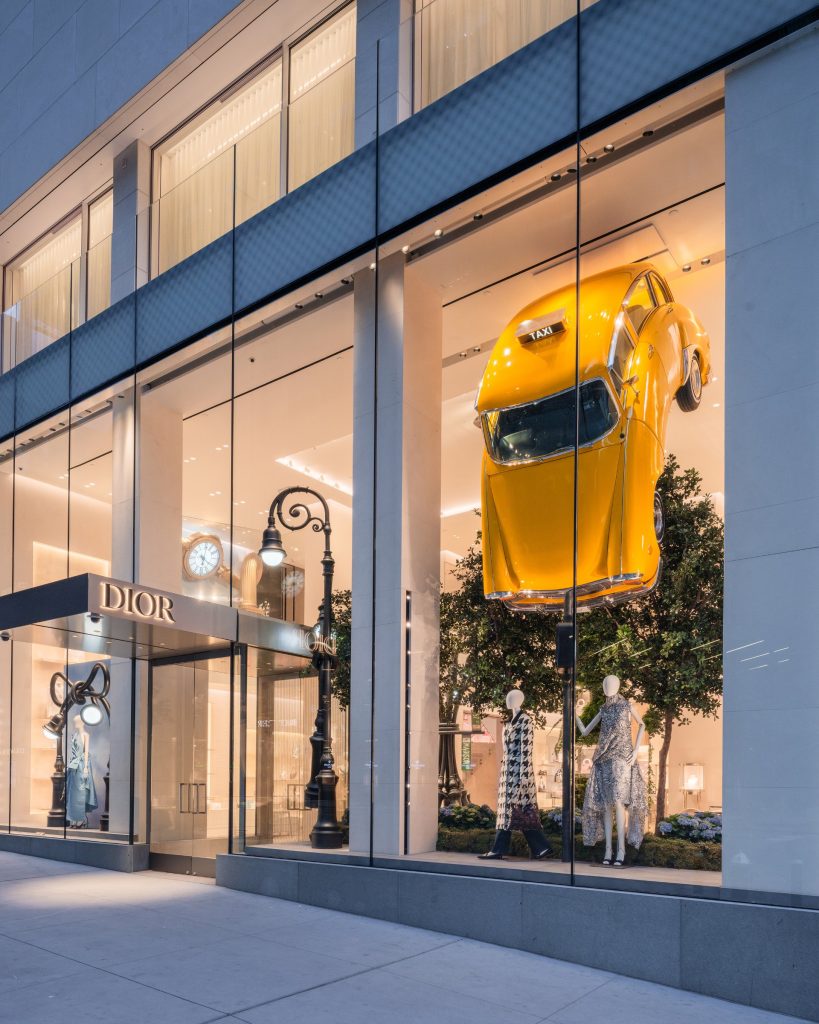 Dior window display by Alex Chinneck