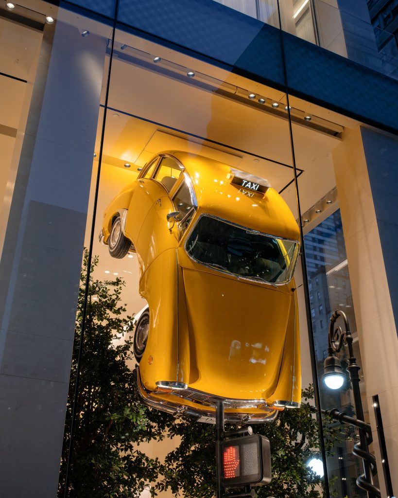 Dior window display by Alex Chinneck
