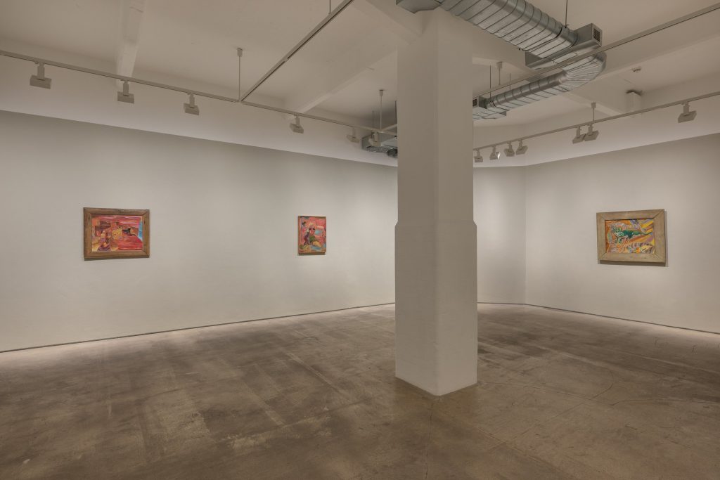 Carole Gibbons paintings in a columned gallery