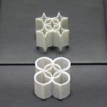 Star-shaped ambiguous cylinders by Kokichi Sugihara in front of a mirror