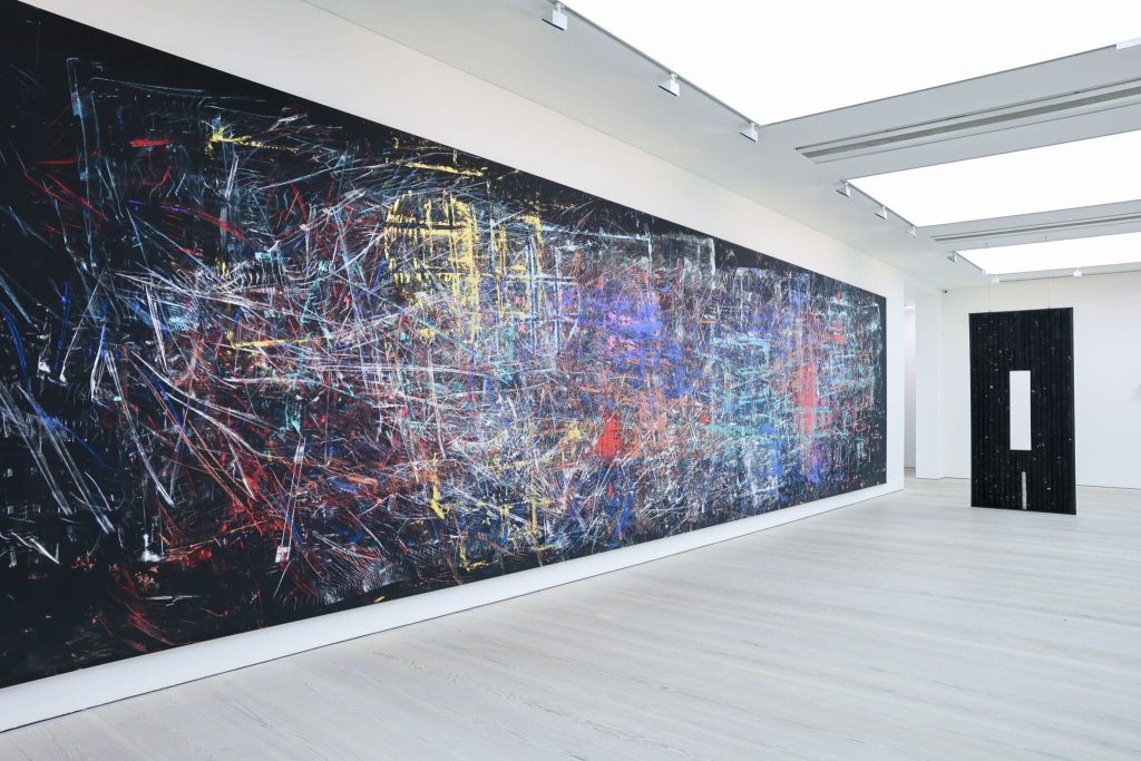 Large gestural painting across a long gallery wall