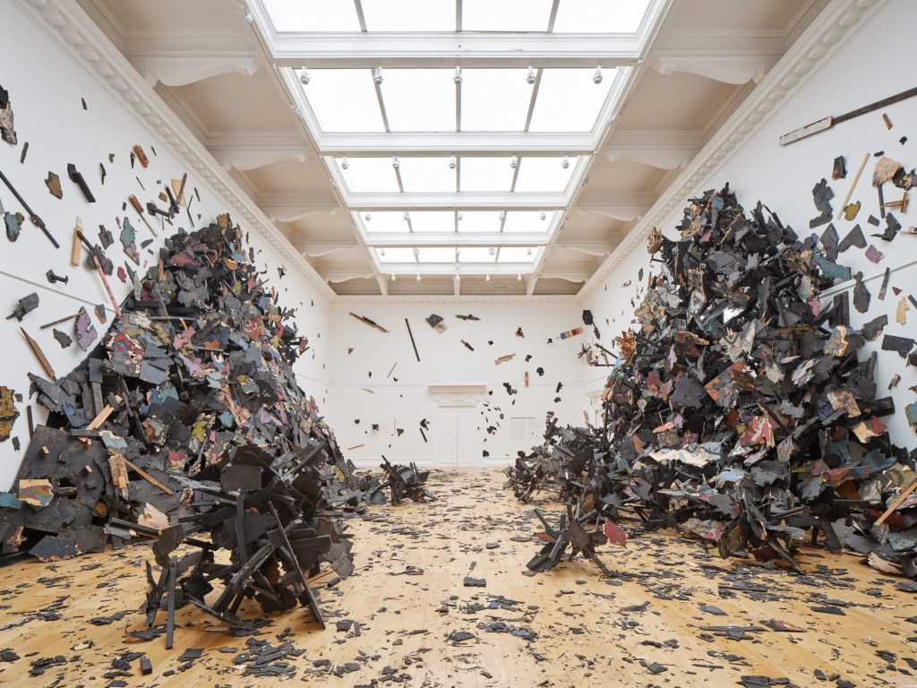Leonardo Drew installation of fragments across a skylit gallery